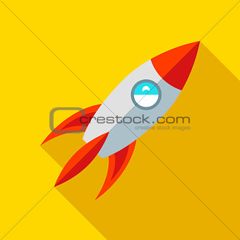 Children's toy rocket on a yellow background