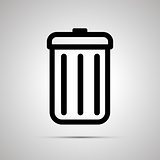 Simple black icon of trash can on light background