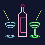 Neon cocktail glasses and bottle.