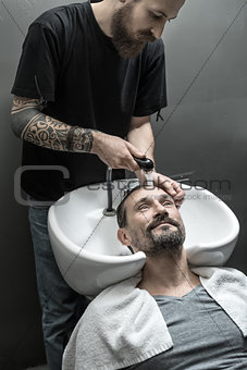 Washing head in barbershop