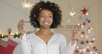 Happy young woman celebrating Christmas