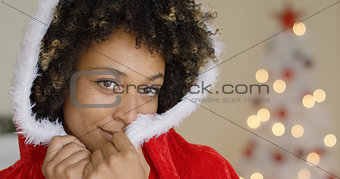 Sensual young woman in a Santa Claus outfit