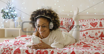 Attractive young woman relaxing at Christmas