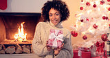 Close up of beautiful black woman holding present