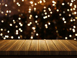 Wooden table with defocussed Christmas image