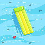Green Inflatable Matrass With Blue Sea Water On Background