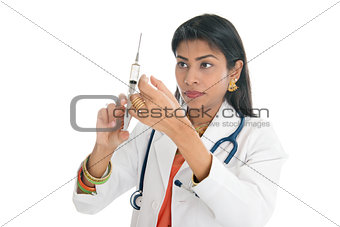 Indian female doctor with syringe