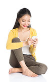 Young Asian girl using smartphone