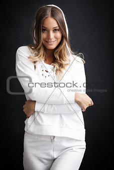 Woman in white sportsuit