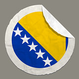 Bosnia and Herzegovina flag on a paper label