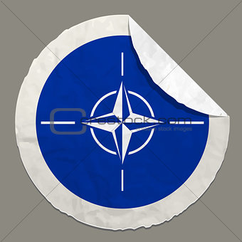 NATO flag on a paper label
