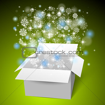 Open white gift box on the snow. Christmas green background
