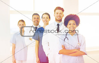 group of happy doctors at hospital