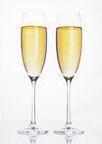 Glasses of sparkling champagne with bubbles white