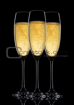 Glasses of sparkling champagne with bubbles black