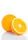 Healthy organic orange with slice on white