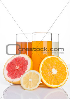 Glasses of healthy grapefruit and orange juice