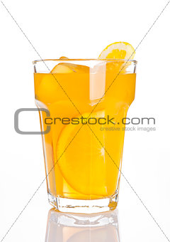 Glass of healthy orange juice with ice cubes