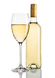 Bottle and glass of white wine with reflection