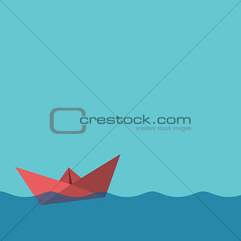 One red paper boat
