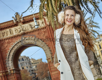 happy fashion-monger near Arc de Triomf in Barcelona, Spain