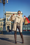 happy tourist woman near Galleria Vittorio Emanuele II rejoicing