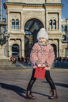elegant girl at Piazza del Duomo in Milan, Italy standing