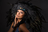 Portrait of young woman in costume of  American Indian