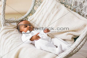 Adorable little african american baby boy looking - Black people