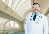Handsome Hispanic Male Doctor or Nurse Inside Hospital Building