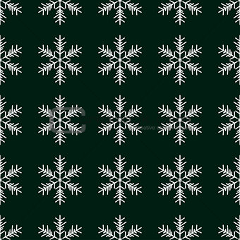 Seamless pattern with snowflakes on green