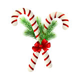 Christmas candy cane decorated with a bow and tree branches