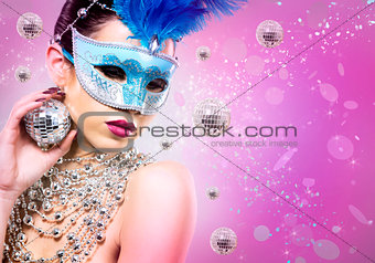 disco woman wearing silver accessories on purple backgound