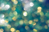 Vintage abstract background with a large multi-colored bokeh