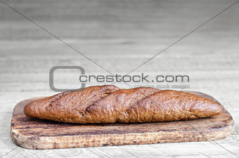 Bread is on grey wooden background
