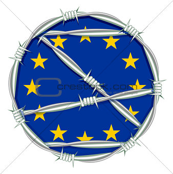 Yellow stars on blue background symbol of European Union behind barbed wire. Migration problem