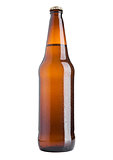 Brown beer bottle cold with frost on white