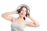 Horizontal portrait of a girl listening to music on headphones