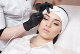 Permanent makeup. Tattooing of eyebrows