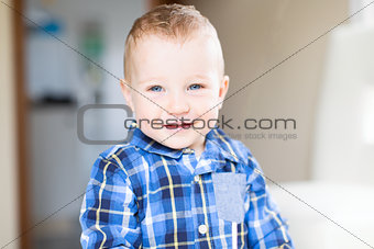 handsome smiling toddler boy