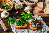 Italian Snack Bruschetta with Greens and Mushrooms