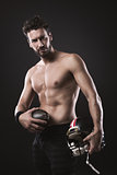 Shirtless football player with helmet