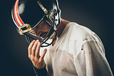 Football player with helmet