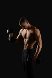 Male bodybuilder posing in studio