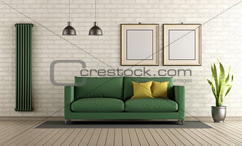 Modern living room with green sofa