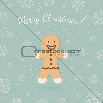 Christmas ginger cookie on winter backdrop.