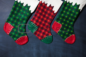 Christmas stocking on a blackboard background, xmas card