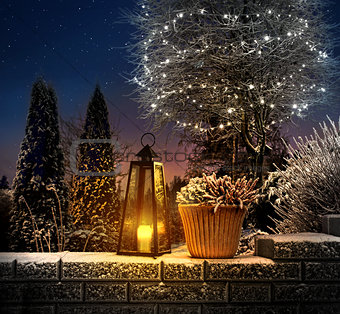 Christmas lantern in winter garden