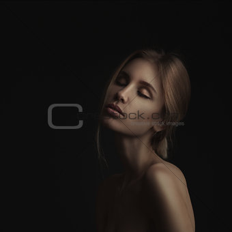 portrait of beautiful woman with closed eyes