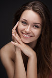 Young smiling woman with beautiful healthy face